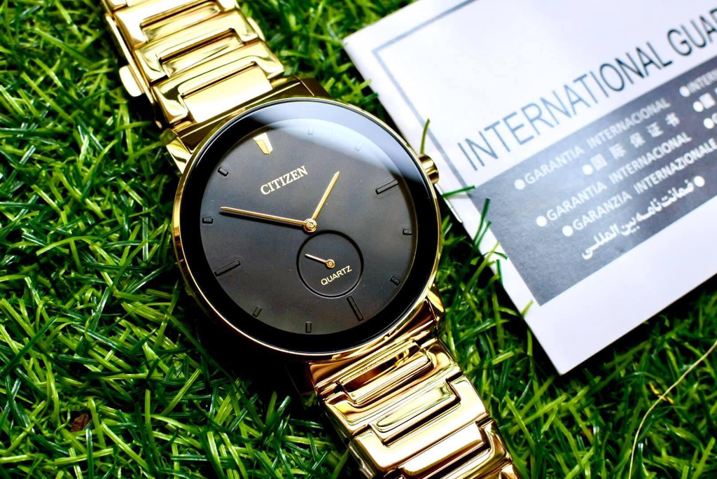 BE9182-57E gold steel black dail