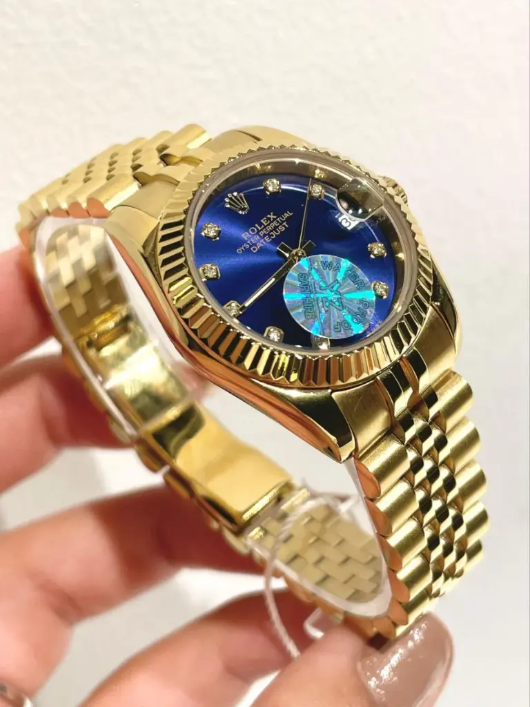 gold Rolex Datejust, likely-23