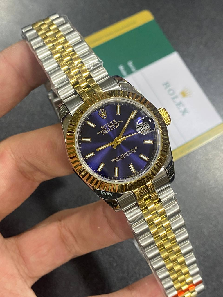 Rolex Datejust wristwatch featuring a two-tone stainless-55