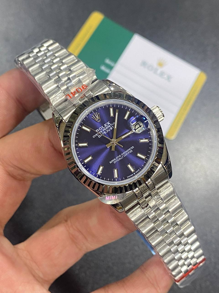 Rolex Datejust watch featuring a deep blue sunburst -115