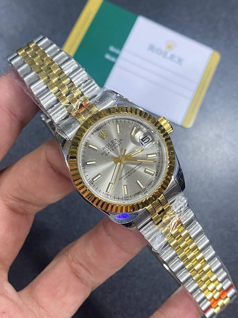 Rolex Datejust in silver and gold-117