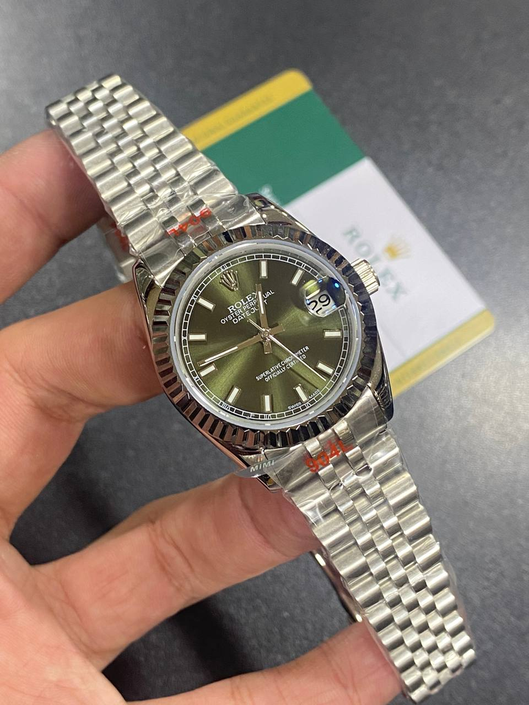 Rolex Datejust featuring a distinctive green-129