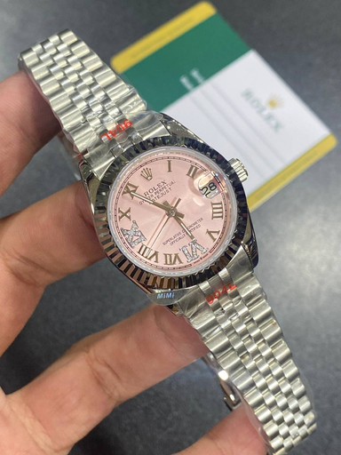 [Rolex Lady-Datejust 28 or 31, featuring a pink -121]  Rolex Lady-Datejust 28 or 31, featuring a pink -121